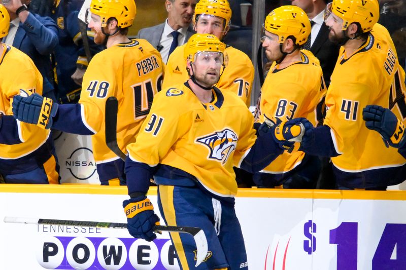 Mar 24, 2026; Nashville, Tennessee, USA;  Nashville Predators center Steven Stamkos (91) celebrates with his teammates after scoring a goal against the San Jose Sharks during the second period at Bridgestone Arena. Mandatory Credit: Steve Roberts-Imagn Images