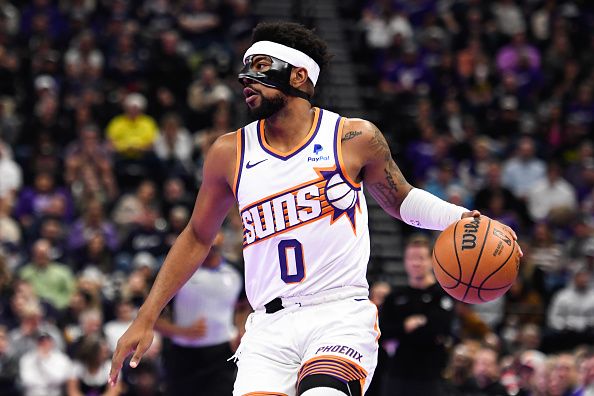 SALT LAKE CITY, UTAH - NOVEMBER 17: Jordan Goodwin #0 of the Phoenix Suns in action during the first half of an NBA In-Season Tournament game against the Utah Jazz at Delta Center on November 17, 2023 in Salt Lake City, Utah. NOTE TO USER: User expressly acknowledges and agrees that, by downloading and or using this photograph, User is consenting to the terms and conditions of the Getty Images License Agreement. (Photo by Alex Goodlett/Getty Images)