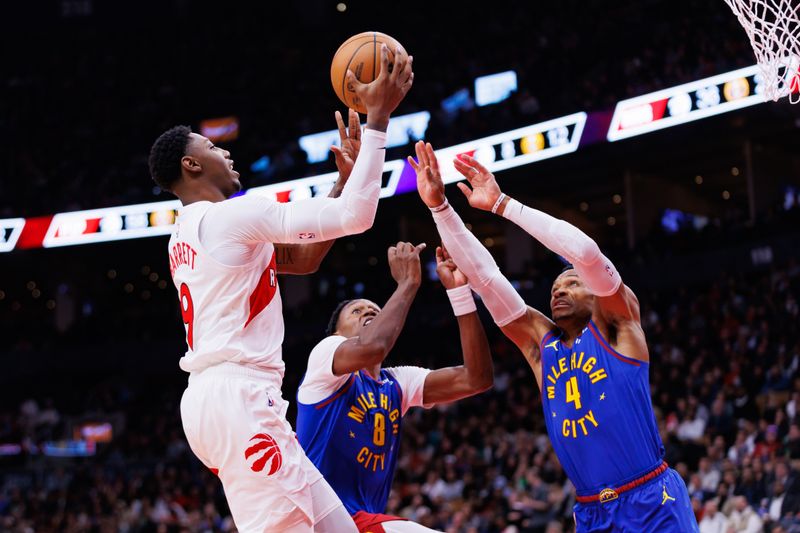 TORONTO, CANADA - OCTOBER 28: RJ Barrett #9 of the Toronto Raptors puts up a shot over Russell Westbrook #4 of the Denver Nuggets during the second half of their NBA game against the Denver Nuggets at Scotiabank Arena on October 28, 2024 in Toronto, Ontario, Canada. NOTE TO USER: User expressly acknowledges and agrees that, by downloading and or using this photograph, User is consenting to the terms and conditions of the Getty Images License Agreement. (Photo by Cole Burston/Getty Images)