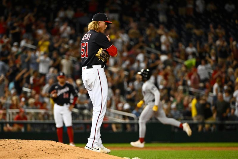 Aug 16, 2023; Washington, District of Columbia, USA; Washington Nationals relief pitcher Jordan Weems (51) reacts after giving up a two run home run to Boston Red Sox shortstop Pablo Reyes (19) during the eighth inning at Nationals Park. Mandatory Credit: Brad Mills-USA TODAY Sports