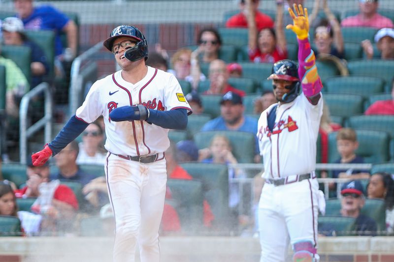 Sep 28, 2025; Cumberland, Georgia, USA; Atlanta Braves shortstop Nick Allen (2) slides into home plate for a run against the Pittsburgh Pirates during the eighth inning at Truist Park. Mandatory Credit: Jordan Godfree-Imagn Images