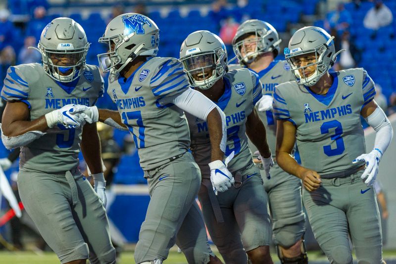 Oct 17, 2020; Memphis, Tennessee, USA; Memphis Tigers running back Kylan Watkins (17) celebrates after scoring a touchdown against the UCF Knights during the second half  at Liberty Bowl Memorial Stadium. Mandatory Credit: Justin Ford-USA TODAY Sports