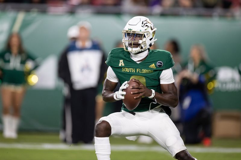 Nov 6, 2021; Tampa, Florida, USA; South Florida Bulls quarterback Timmy McClain (9) runs with the ball during the first quarter against the Houston Cougars at Raymond James Stadium. Mandatory Credit: Matt Pendleton-USA TODAY Sports