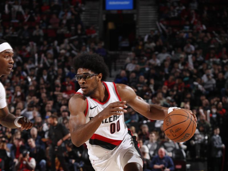 PORTLAND, OR - MARCH 22:  Scoot Henderson #00 of the Portland Trail Blazers goes to the basket during the game on March 22, 2024 at the Moda Center Arena in Portland, Oregon. NOTE TO USER: User expressly acknowledges and agrees that, by downloading and or using this photograph, user is consenting to the terms and conditions of the Getty Images License Agreement. Mandatory Copyright Notice: Copyright 2024 NBAE (Photo by Cameron Browne/NBAE via Getty Images)