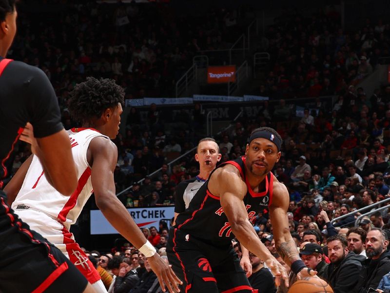 TORONTO, CANADA - FEBRUARY 9: Bruce Brown #11 of the Toronto Raptors passes the ball during the game against the Houston Rockets on February 9, 2024 at the Scotiabank Arena in Toronto, Ontario, Canada.  NOTE TO USER: User expressly acknowledges and agrees that, by downloading and or using this Photograph, user is consenting to the terms and conditions of the Getty Images License Agreement.  Mandatory Copyright Notice: Copyright 2024 NBAE (Photo by Vaughn Ridley/NBAE via Getty Images)