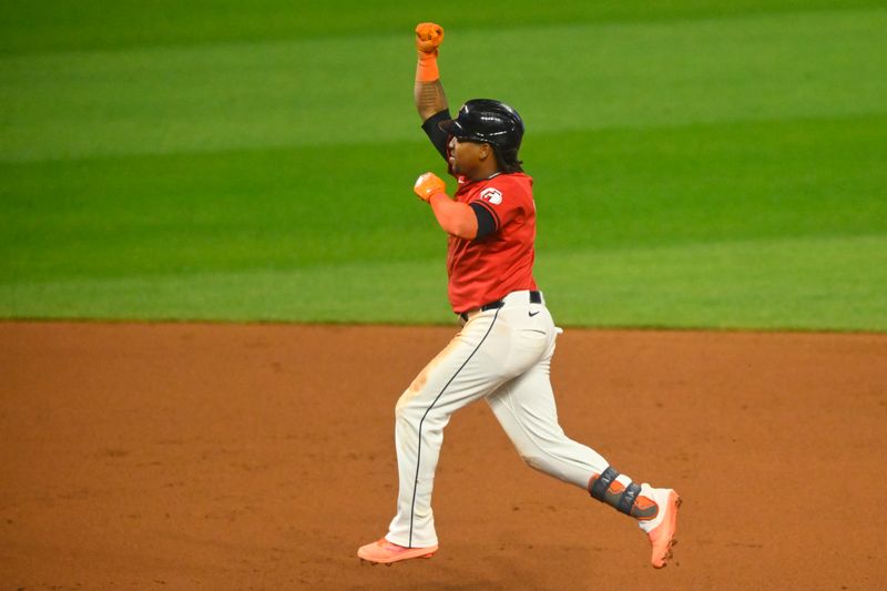 Sep 25, 2024; Cleveland, Ohio, USA; Cleveland Guardians third baseman Jose Ramirez (11) celebrates his three-run home run in the eighth inning against the Cincinnati Reds at Progressive Field. Mandatory Credit: David Richard-Imagn Images