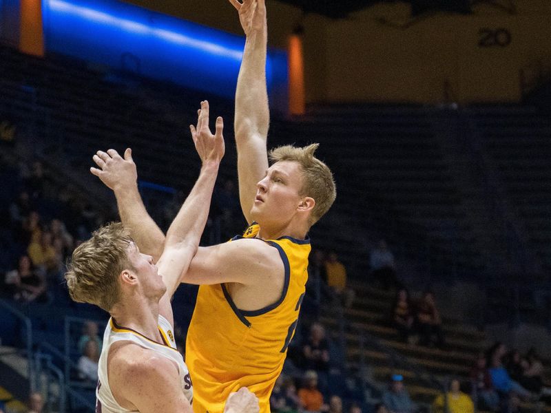 Feb 11, 2023; Berkeley, California, USA; California Golden Bears forward Lars Thiemann (21) shoots over Arizona State Sun Devils forward Duke Brennan (24) during the second half at Haas Pavilion. Mandatory Credit: Neville E. Guard-USA TODAY Sports