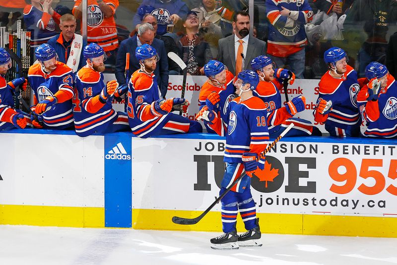 Jan 6, 2024; Edmonton, Alberta, CAN; Edmonton Oilers forward Zach Hyman (18) celebrates with teammates after scoring his  third goal of the game against the Ottawa Senators during the third period at Rogers Place. Mandatory Credit: Perry Nelson-USA TODAY Sports