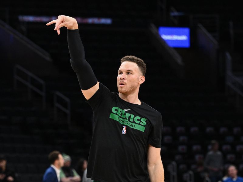 BOSTON, MASSACHUSETTS - MARCH 05: Blake Griffin #91 of the Boston Celtics takes a shot during warmups before a game against the New York Knicks at the TD Garden on March 05, 2023 in Boston, Massachusetts. NOTE TO USER: User expressly acknowledges and agrees that, by downloading and or using this photograph, User is consenting to the terms and conditions of the Getty Images License Agreement. (Photo by Brian Fluharty/Getty Images)