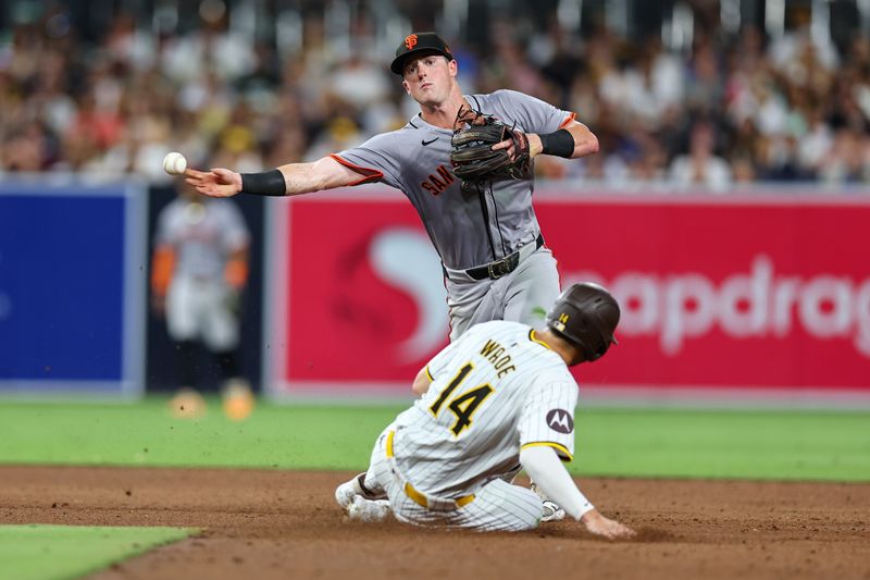 Sep 7, 2024; San Diego, California, USA; San Francisco Giants shortstop Tyler Fitzgerald (49) turns a double play on a ground ball by San Diego Padres shortstop Mason McCoy (18) during the sixth inning at Petco Park. Mandatory Credit: Chadd Cady-Imagn Images