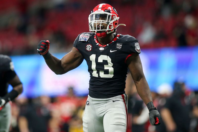 Jan 1, 2021; Atlanta, GA, USA; Georgia Bulldogs linebacker Azeez Ojulari (13) celebrates after a sack against the Cincinnati Bearcats in the second half of the Chick-fil-A Peach Bowl at Mercedes-Benz Stadium. Mandatory Credit: Brett Davis-USA TODAY Sports
