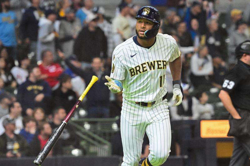 Apr 6, 2025; Milwaukee, Wisconsin, USA;  Milwaukee Brewers left fielder Jackson Chourio (11) reacts after hitting a solo home run in the seventh inning against the Cincinnati Reds at American Family Field. Mandatory Credit: Benny Sieu-Imagn Images