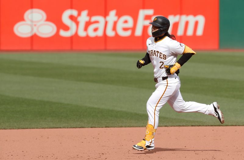 May 11, 2024; Pittsburgh, Pennsylvania, USA;  Pittsburgh Pirates first baseman Connor Joe (2) circles the bases on a three run home run against the Chicago Cubs during the third inning at PNC Park. Mandatory Credit: Charles LeClaire-USA TODAY Sports