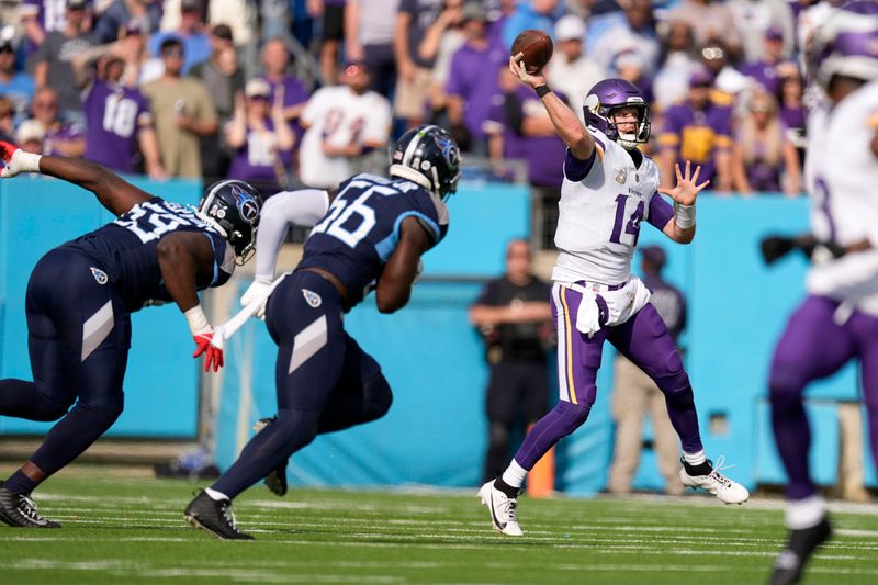 Minnesota Vikings quarterback Sam Darnold (14) throws a pass during the first half of an NFL football game against the Tennessee Titans, Sunday, Nov. 17, 2024, in Nashville, Tenn. (AP Photo/George Walker IV)