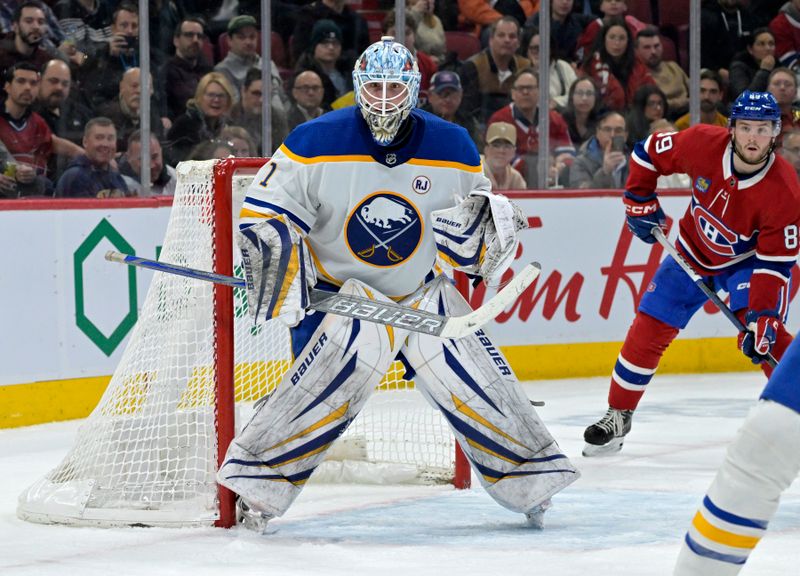 Feb 21, 2024; Montreal, Quebec, CAN; Buffalo Sabres goalie Ukko-Pekka Luukkonen (1) tracks the puck during the third period of the game against the Montreal Canadiens  at the Bell Centre. Mandatory Credit: Eric Bolte-USA TODAY Sports