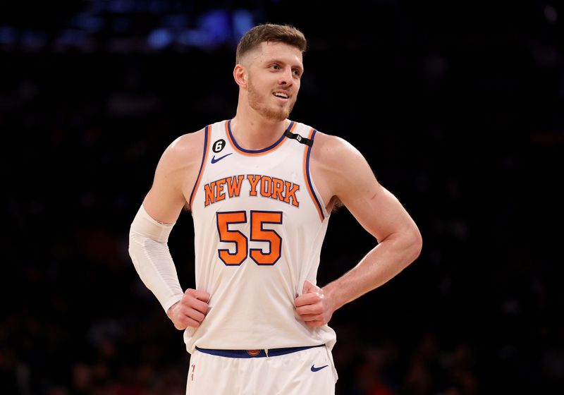 NEW YORK, NEW YORK - MARCH 27: Isaiah Hartenstein #55 of the New York Knicks looks on during the first half against the Houston Rockets at Madison Square Garden on March 27, 2023 in New York City. NOTE TO USER: User expressly acknowledges and agrees that, by downloading and or using this photograph, User is consenting to the terms and conditions of the Getty Images License Agreement. (Photo by Elsa/Getty Images)