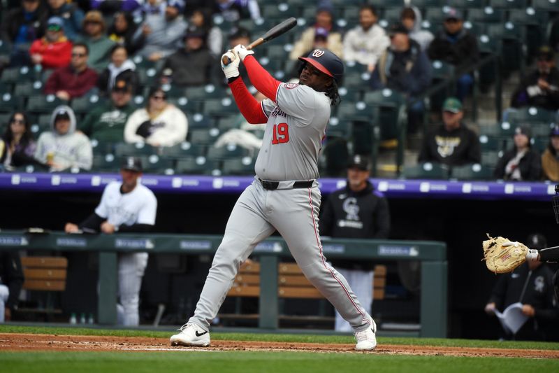 Apr 19, 2025; Denver, Colorado, USA; Washington Nationals first base Josh Bell (19) hits a home run during the fourth inning against the Colorado Rockies at Coors Field. Mandatory Credit: Christopher Hanewinckel-Imagn Images