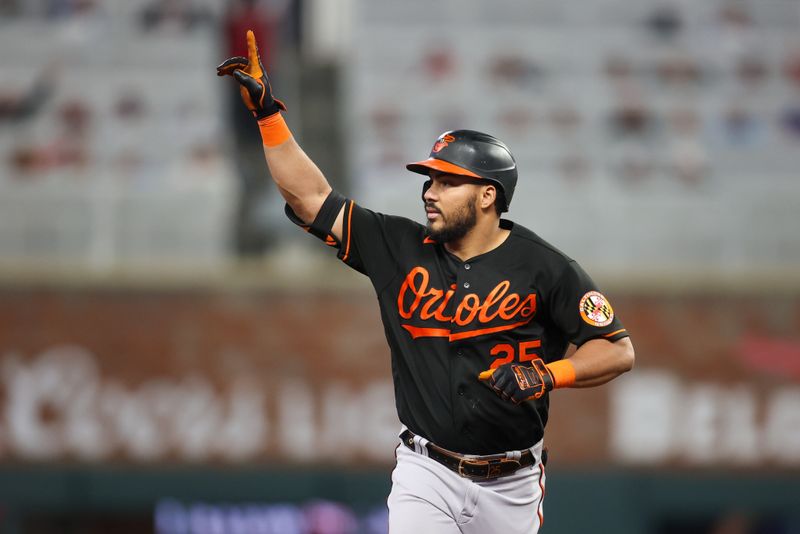 May 5, 2023; Atlanta, Georgia, USA; Baltimore Orioles right fielder Anthony Santander (25) celebrates after a grand slam against the Atlanta Braves in the seventh inning at Truist Park. Mandatory Credit: Brett Davis-USA TODAY Sports
