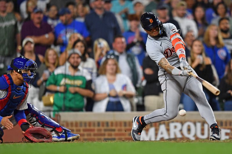 Aug 20, 2024; Chicago, Illinois, USA; Detroit Tigers shortstop Javier Báez (28) strikes out to end the game against the Chicago Cubs at Wrigley Field. Mandatory Credit: Patrick Gorski-USA TODAY Sports