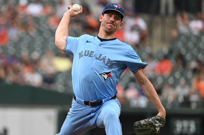 Jul 30, 2024; Baltimore, Maryland, USA;  Toronto Blue Jays pitcher Chris Bassitt (40) throws a first inning pitch against the Baltimore Orioles at Oriole Park at Camden Yards. Mandatory Credit: Tommy Gilligan-USA TODAY Sports