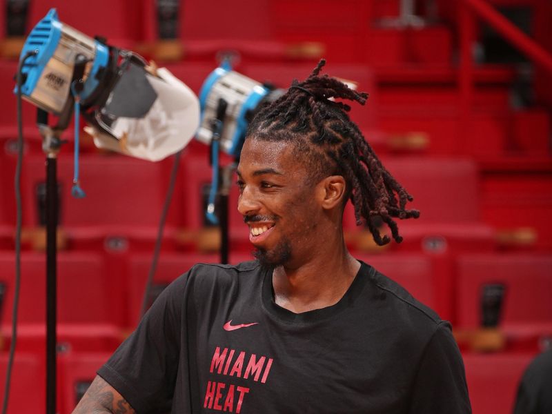 MIAMI, FL - MARCH 2: Delon Wright #4 of the Miami Heat smiles before the game against the Utah Jazz on March 2, 2024 at Kaseya Center in Miami, Florida. NOTE TO USER: User expressly acknowledges and agrees that, by downloading and or using this Photograph, user is consenting to the terms and conditions of the Getty Images License Agreement. Mandatory Copyright Notice: Copyright 2024 NBAE (Photo by Issac Baldizon/NBAE via Getty Images)