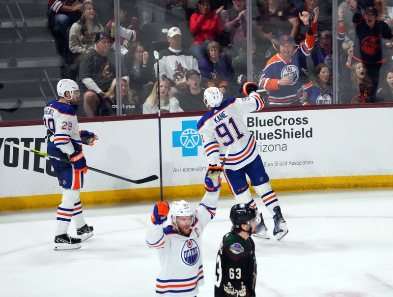 Feb 19, 2024; Tempe, Arizona, USA; Edmonton Oilers left wing Evander Kane (91) celebrates a goal against the Arizona Coyotes during the third period at Mullett Arena. Mandatory Credit: Joe Camporeale-USA TODAY Sports