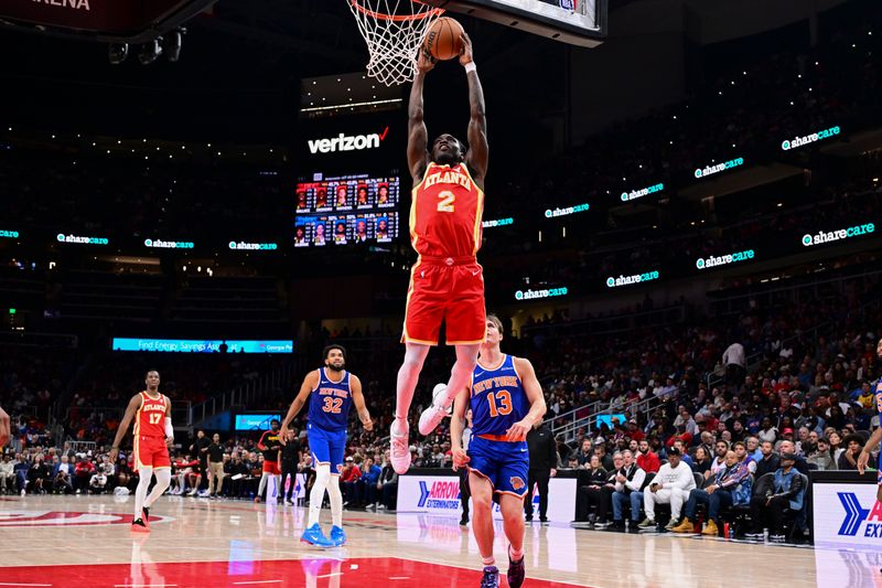 ATLANTA, GA - November 6:  Keaton Wallace #2 of the Atlanta Hawks dunks the ball during the game against the New York Knicks on November 6, 2024 at State Farm Arena in Atlanta, Georgia.  NOTE TO USER: User expressly acknowledges and agrees that, by downloading and/or using this Photograph, user is consenting to the terms and conditions of the Getty Images License Agreement. Mandatory Copyright Notice: Copyright 2024 NBAE (Photo by Adam Hagy/NBAE via Getty Images)