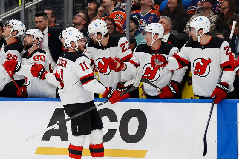 Nov 4, 2024; Edmonton, Alberta, CAN; The New Jersey Devils celebrate a goal by forward Stefan Noesen (11) during the first period against the Edmonton Oilers at Rogers Place. Mandatory Credit: Perry Nelson-Imagn Images