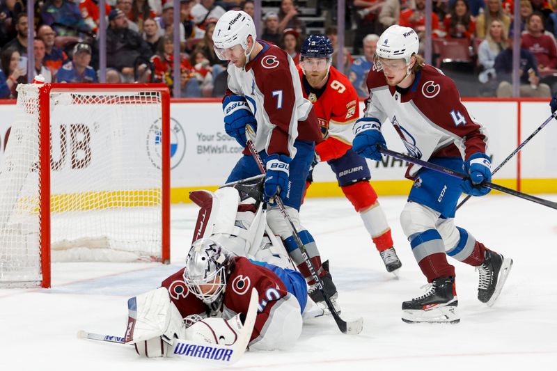 Feb 11, 2023; Sunrise, Florida, USA; Colorado Avalanche goaltender Alexandar Georgiev (40) dives to controls the puck during the second period against the Florida Panthers at FLA Live Arena. Mandatory Credit: Sam Navarro-USA TODAY Sports