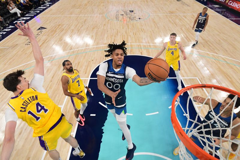 PALM SPRINGS, CA - OCTOBER 4: Terrence Shannon #00 of the Minnesota Timberwolves drives to the basket during the game against the Los Angeles Lakers during an NBA preseason game on October 4, 2024 at Acrisure Arena in Palm Springs, California. NOTE TO USER: User expressly acknowledges and agrees that, by downloading and/or using this Photograph, user is consenting to the terms and conditions of the Getty Images License Agreement. Mandatory Copyright Notice: Copyright 2024 NBAE (Photo by Adam Pantozzi/NBAE via Getty Images)