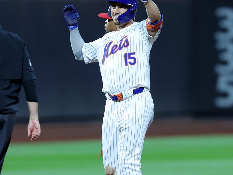 Sep 17, 2024; New York City, New York, USA; New York Mets left fielder Tyrone Taylor (15) celebrates his RBI double against the Washington Nationals during the fifth inning at Citi Field. Mandatory Credit: Brad Penner-Imagn Images