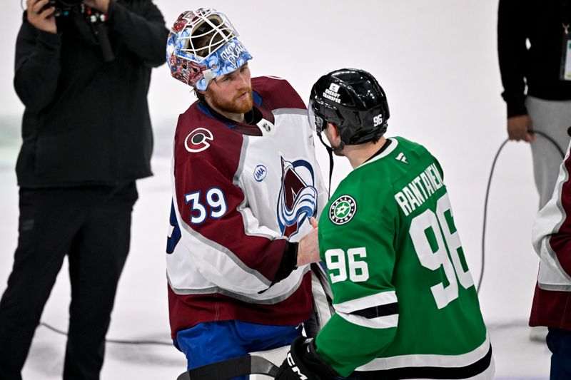 May 3, 2025; Dallas, Texas, USA; Colorado Avalanche goaltender Mackenzie Blackwood (39) shakes hands with Dallas Stars right wing Mikko Rantanen (96) after the Stars defeats the Avalanche in game seven of the first round of the 2025 Stanley Cup Playoffs at American Airlines Center. Mandatory Credit: Jerome Miron-Imagn Images