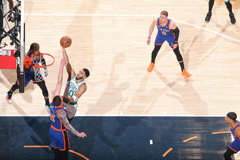 NEW YORK, NY - FEBRUARY 24: Jayson Tatum #0 of the Boston Celtics drives to the basket during the game against the New York Knicks on February 24, 2024 at Madison Square Garden in New York City, New York.  NOTE TO USER: User expressly acknowledges and agrees that, by downloading and or using this photograph, User is consenting to the terms and conditions of the Getty Images License Agreement. Mandatory Copyright Notice: Copyright 2024 NBAE  (Photo by Nathaniel S. Butler/NBAE via Getty Images)