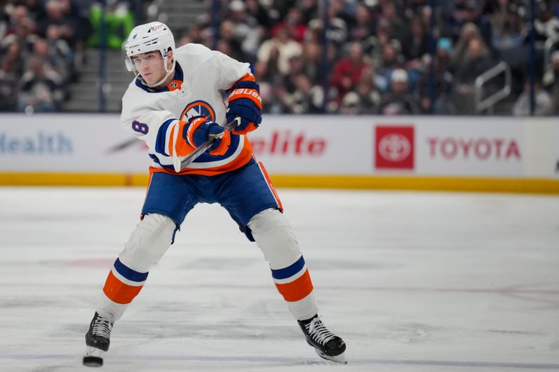 Apr 4, 2024; Columbus, Ohio, USA;  New York Islanders defenseman Noah Dobson (8) passes the puck against the Columbus Blue Jackets in the third period at Nationwide Arena. Mandatory Credit: Aaron Doster-USA TODAY Sports