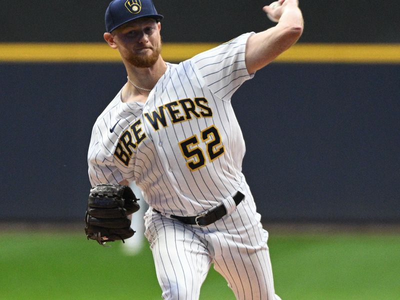 Sep 30, 2023; Milwaukee, Wisconsin, USA; Milwaukee Brewers starting pitcher Eric Lauer (52) delivers a pitch against the Chicago Cubs in the first inning at American Family Field. Mandatory Credit: Michael McLoone-USA TODAY Sports