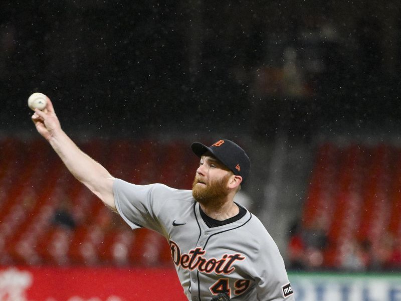 May 19, 2025; St. Louis, Missouri, USA;  Detroit Tigers relief pitcher John Brebbia (49) pitches against the St. Louis Cardinals during the seventh inning at Busch Stadium. Mandatory Credit: Jeff Curry-Imagn Images
