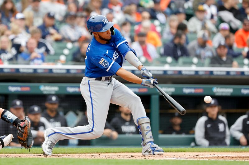 Sep 28, 2023; Detroit, Michigan, USA; Kansas City Royals designated hitter Edward Olivares (14) hits an RBI single in the first inning against the Detroit Tigers at Comerica Park. Mandatory Credit: Rick Osentoski-USA TODAY Sports