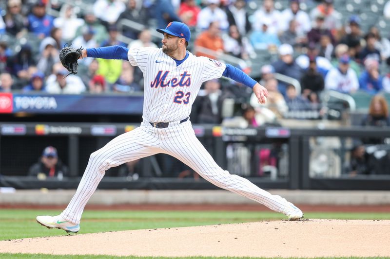 Apr 6, 2025; New York City, New York, USA;  New York Mets starting pitcher David Peterson (23) pitches in the first inning against the Toronto Blue Jays at Citi Field. Mandatory Credit: Wendell Cruz-Imagn Images