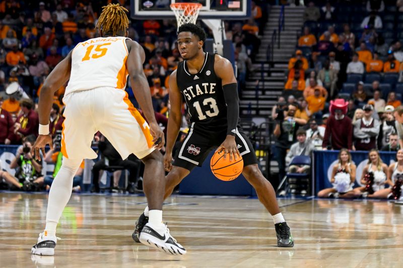 Mar 15, 2024; Nashville, TN, USA; Mississippi State Bulldogs guard Josh Hubbard (13) dribbles against the Tennessee Volunteers during the first half at Bridgestone Arena. Mandatory Credit: Steve Roberts-USA TODAY Sports