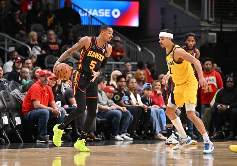 ATLANTA, GEORGIA - JANUARY 12: Dejounte Murray #5 of the Atlanta Hawks drives to the basket during the game against the Indiana Pacers on January 12, 2024 at State Farm Arena in Atlanta, Georgia.  NOTE TO USER: User expressly acknowledges and agrees that, by downloading and or using this photograph, User is consenting to the terms and conditions of the Getty Images License Agreement. (Photo by Paras Griffin/Getty Images)