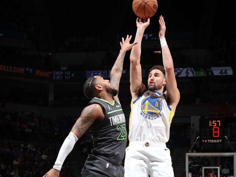 MINNEAPOLIS, MN -  MARCH 24: Klay Thompson #11 of the Golden State Warriors shoots the ball during the game against the Minnesota Timberwolves on March 24, 2024 at Target Center in Minneapolis, Minnesota. NOTE TO USER: User expressly acknowledges and agrees that, by downloading and or using this Photograph, user is consenting to the terms and conditions of the Getty Images License Agreement. Mandatory Copyright Notice: Copyright 2024 NBAE (Photo by David Sherman/NBAE via Getty Images)