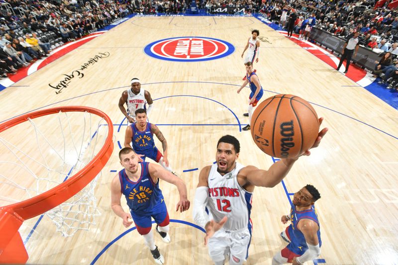 DETROIT, MI - FEBRUARY 28:  Tobias Harris #12 of the Detroit Pistons drives to the basket during the game against the Denver Nuggets on February 28, 2025 at Little Caesars Arena in Detroit, Michigan. NOTE TO USER: User expressly acknowledges and agrees that, by downloading and/or using this photograph, User is consenting to the terms and conditions of the Getty Images License Agreement. Mandatory Copyright Notice: Copyright 2025 NBAE (Photo by Chris Schwegler/NBAE via Getty Images)