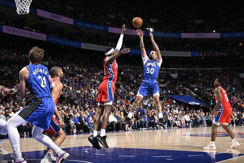 PHILADELPHIA, PA - APRIL 12: Cole Anthony #50 of the Orlando Magic shoots the ball during the game against the Philadelphia 76ers on April 12, 2024 at the Wells Fargo Center in Philadelphia, Pennsylvania NOTE TO USER: User expressly acknowledges and agrees that, by downloading and/or using this Photograph, user is consenting to the terms and conditions of the Getty Images License Agreement. Mandatory Copyright Notice: Copyright 2024 NBAE (Photo by David Dow/NBAE via Getty Images)