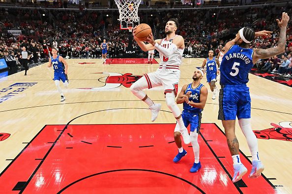 CHICAGO, ILLINOIS - NOVEMBER 15:  Zach Lavine #8 of the Chicago Bulls controls the ball against the Orlando Magic on November 15, 2023 at United Center in Chicago, Illinois.   NOTE TO USER: User expressly acknowledges and agrees that, by downloading and or using this photograph, User is consenting to the terms and conditions of the Getty Images License Agreement.  (Photo by Jamie Sabau/Getty Images)