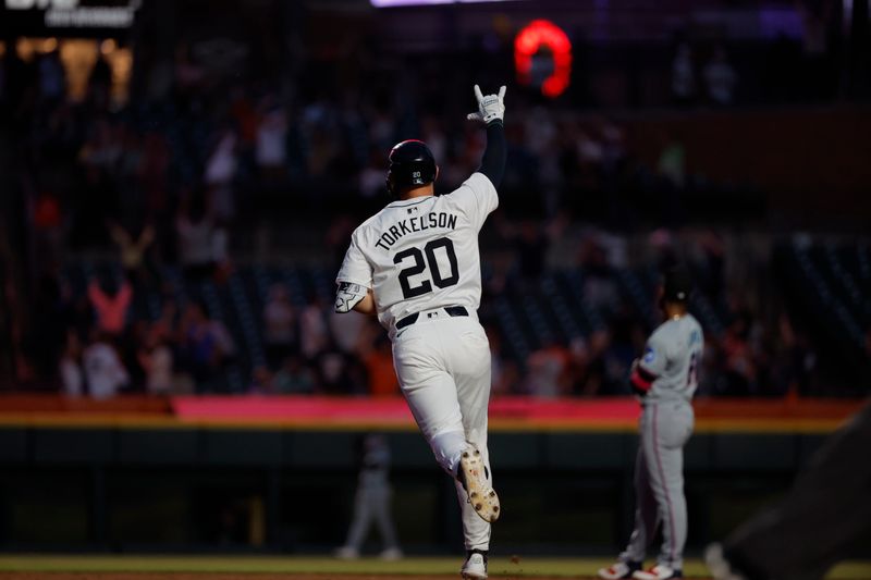 May 13, 2024; Detroit, Michigan, USA;  Detroit Tigers first base Spencer Torkelson (20) celebrates after he hits a two run home run in the eighth inning against the Miami Marlins at Comerica Park. Mandatory Credit: Rick Osentoski-USA TODAY Sports