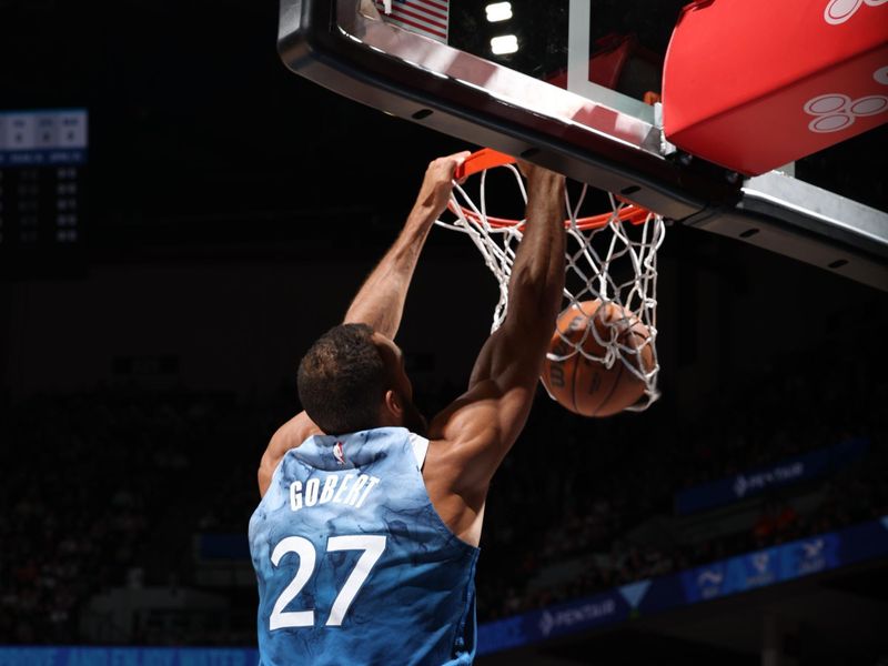 MINNEAPOLIS, MN -  APRIL 12:  Rudy Gobert #27 of the Minnesota Timberwolves dunks the ball during the game against the Atlanta Hawks on April 12, 2024 at Target Center in Minneapolis, Minnesota. NOTE TO USER: User expressly acknowledges and agrees that, by downloading and or using this Photograph, user is consenting to the terms and conditions of the Getty Images License Agreement. Mandatory Copyright Notice: Copyright 2024 NBAE (Photo by David Sherman/NBAE via Getty Images)