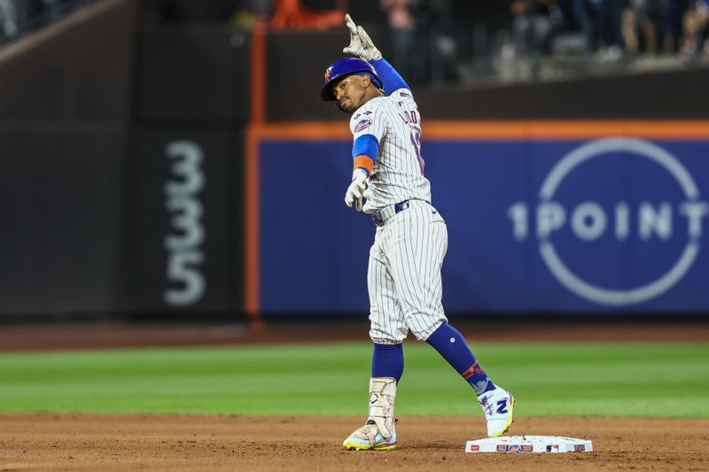 Aug 20, 2024; New York City, New York, USA;  New York Mets shortstop Francisco Lindor (12) reacts after hitting a double in the fifth inning against the Baltimore Orioles at Citi Field. Mandatory Credit: Wendell Cruz-USA TODAY Sports
