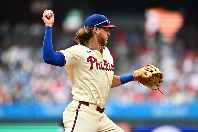 Jun 5, 2024; Philadelphia, Pennsylvania, USA; Philadelphia Phillies infielder Alec Bohm (28) throws to first against the Milwaukee Brewers in the first inning at Citizens Bank Park. Mandatory Credit: Kyle Ross-USA TODAY Sports