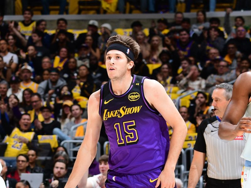 LOS ANGELES, CA - JANUARY 13:  Austin Reaves #15 of the Los Angeles Lakers celebrates during the game against the San Antonio Spurs on January 13, 2025 at Crypto.Com Arena in Los Angeles, California. NOTE TO USER: User expressly acknowledges and agrees that, by downloading and/or using this Photograph, user is consenting to the terms and conditions of the Getty Images License Agreement. Mandatory Copyright Notice: Copyright 2025 NBAE (Photo by Adam Pantozzi/NBAE via Getty Images)