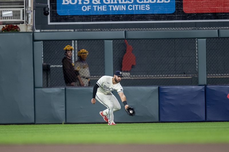 May 10, 2023; Minneapolis, Minnesota, USA; Minnesota Twins left fielder Joey Gallo (13) catches a fly ball in the tenth inning against the San Diego Padres at Target Field. Mandatory Credit: Jesse Johnson-USA TODAY Sports